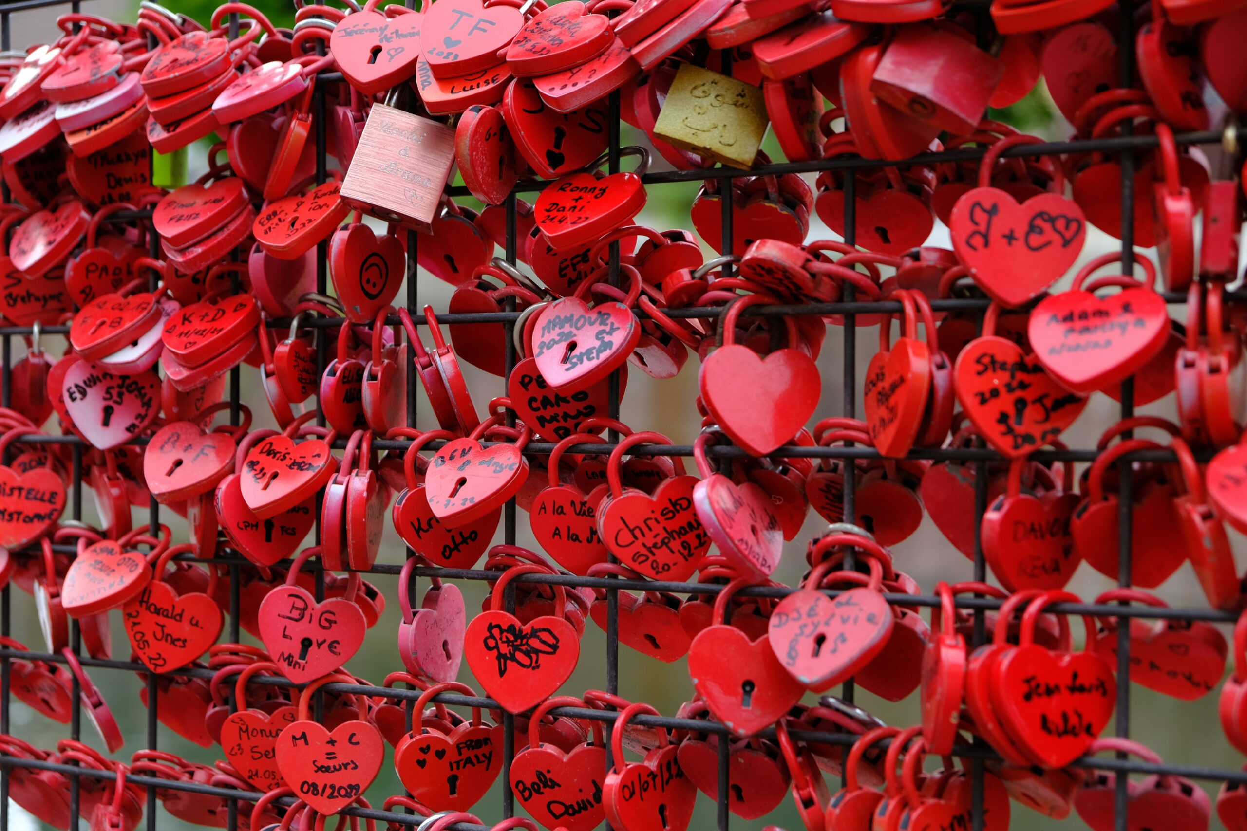 Love locks symbolizing eternal love at one of the best romantic places in Europe for Valentine’s Day.