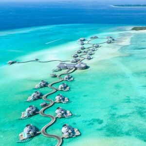 Best resorts with private pools featuring an aerial view of luxury overwater villas with private pools in the Maldives