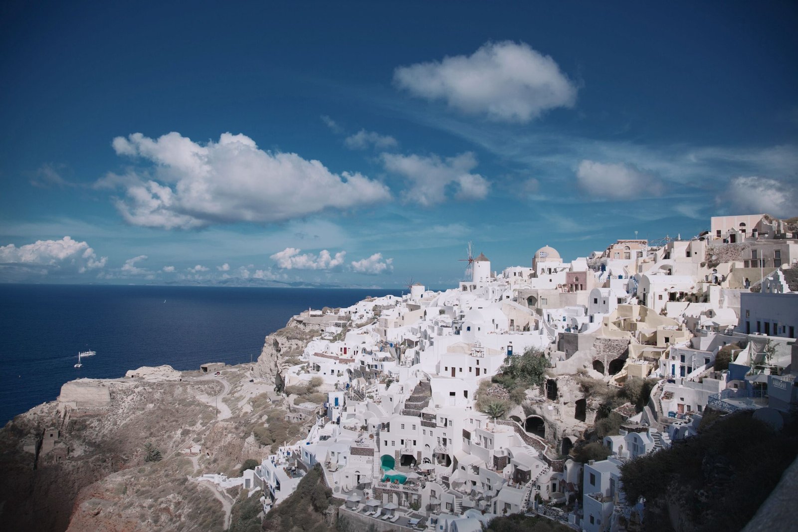 Canaves Oia Suites cave villa terrace view as one of the best resorts with private pools in Santorini